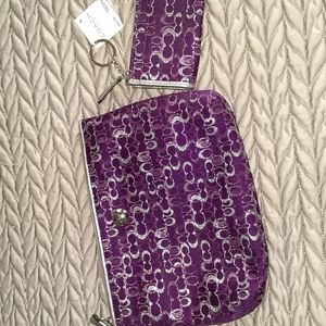 Coach purple wristlet and matching wallet.